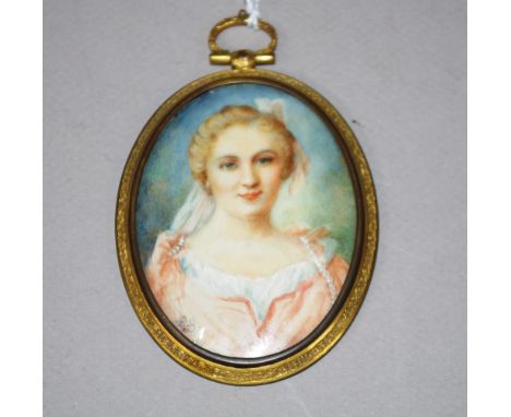 Gilt framed portrait miniature of a lady signed with artists initials, 8cm high (frame) approx.