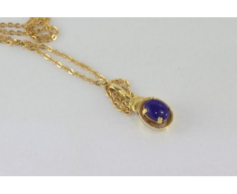 18ct yellow gold and lapis lazuli pendant weight: 2.68 grams, on metal chain
