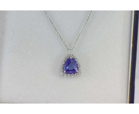 White gold, tanzanite(1.051ct) & diamond pendant on white gold chain marked 18K, total weight: approx 4.56 grams, certificate