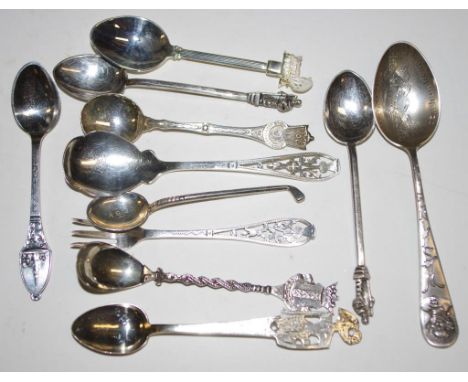 Three various sterling silver teaspoons including 1 marked for Seattle USA , together with 1 small silver fork; and 7 various