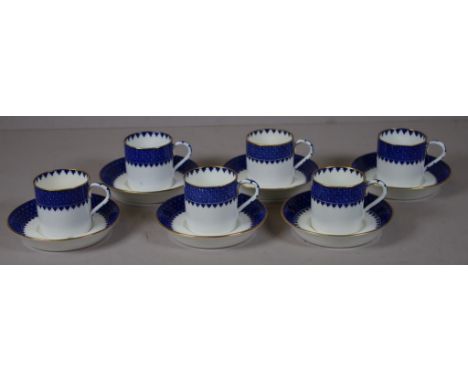 Twelve piece early Wedgwood coffee set 6 each coffee cups and saucers. Blue decorated on white ground.