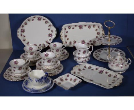 Part Royal Albert "sweet violets" teaset to include 4 trios, 3 extra saucers & plates, 4 serving plates, 1 dish, sugar & crea