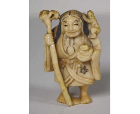 Antique Japanese ivory netsuke - Man & Staff 5cm high, This item may not be exported without CITES documentation.