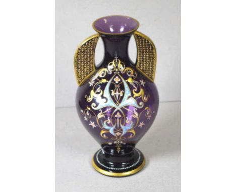 Antique twin handled purple glass vase with gilt & enamel decoration, 23cm high approx.