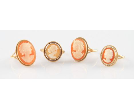 A lot to include four 9ct yellow gold cameo rings, three being of oval form, one being of circular form, all depicting a fema