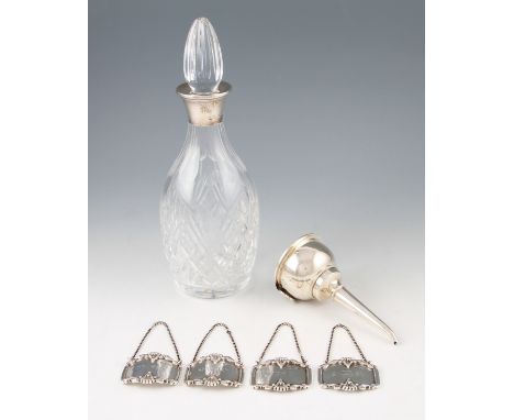 A lot to include cut glass decanter with silver collar, hallmarked 1977 with makers initials FGF, height 29cm, silver wine fu