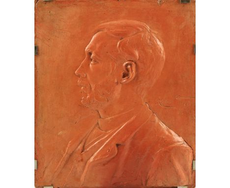 An earthenware plaque depicting a Gentleman bust length portrait in profile by Albert Toft, bears incised signature, mounted 