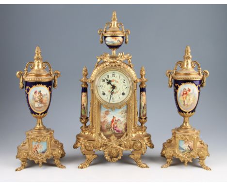 A French ormolu mantel clock garniture of ornate design having central figural design porcelain painted plaque with porcelain