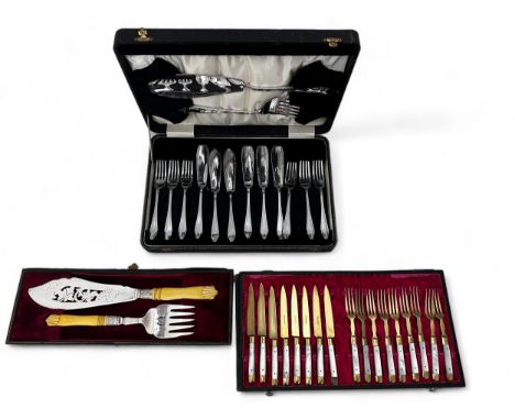 A silver plated set of fish knives, forks and servers, a silver plated fish serving set and a set of Stahl-Bronce (bronze?) k