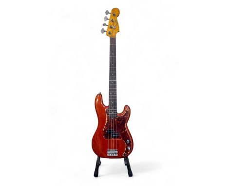 1962 Fender Precision Bass Guitar in a Fiesta Red finish. Serial number 86946 to back plate. Made in Fullerston, USA. Comes w