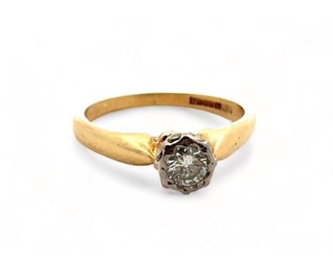 A hallamrked 18ct gold and illusion set diamond ring. Diamond approx 4.3mm in diameter. Clarity estimated SI1/ SI2.