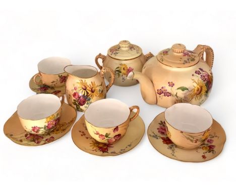 A Royal Worcester blush ivory tea service comprising of a teapot, sugar bowl, cream jug and four cups and saucers. Overall go