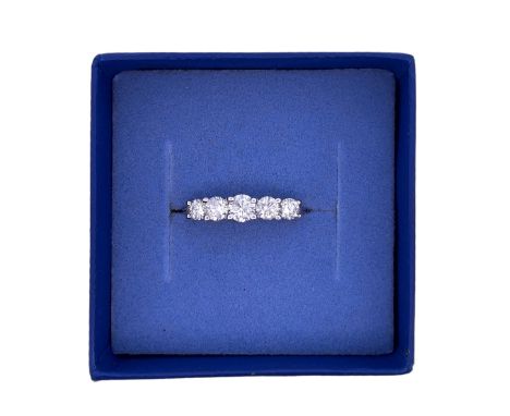 An 18ct white gold five stone diamond ring, size N. Total diamond weight 0.8ct. 2.93g 