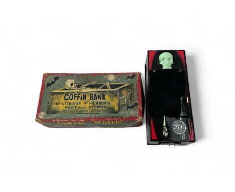 Vintage tinplate Coffin Bank, in original box.