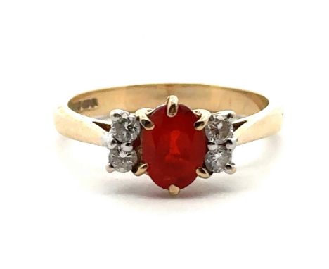 A fire opal and diamond ring in hallmarked 9ct gold, size N.