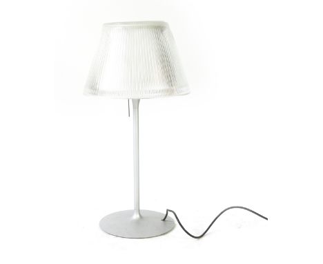 Philippe Starck for Flos, a 'Romeo' standard lamp, the moulded glass shade and cover on a silvered shaft and tulip-type base 