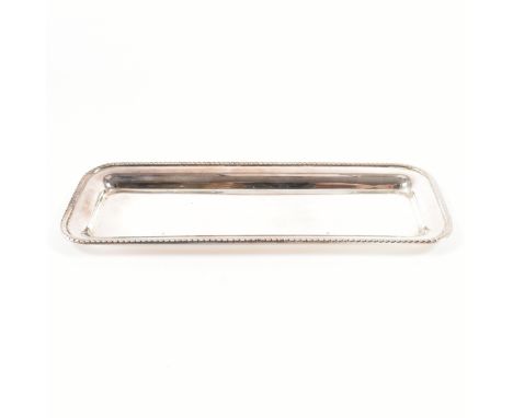 A hallmarked Mappin &amp; Webb silver trinket tray. The tray in rectangular form having gadrooned edges. Hallmarked Birmingha