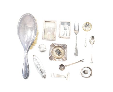 An assorted collection of antique &amp; later silver items. The lot to include; a hairbrush (hallmarked for Birmingham 1922, 