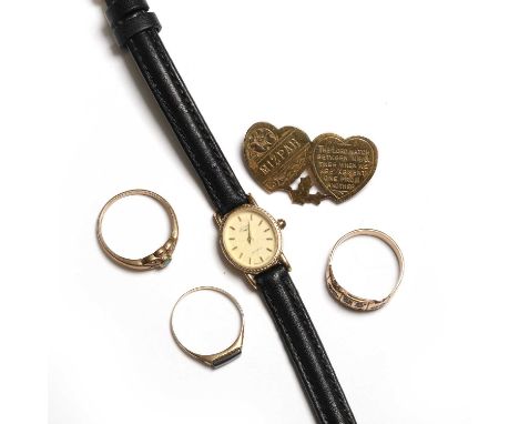 A group of jewellery and watches, comprising:a group of three rings,a 9ct gold onyx ring, Birmingham 1987, a 9ct gold emerald