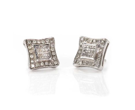 A pair of white gold diamond cluster earrings, each with a central cluster of square cut diamonds in invisible setting, to a 