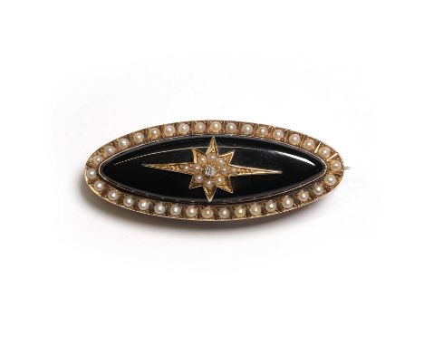 A Victorian onyx, diamond and split pearl mourning brooch, centred with a small old cut diamond to a split pearl starburst su