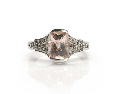 A 14ct white gold morganite ring,  with a checkerboard cushion shape morganite, 9mm x 7mm, into trifurcated shoulders, grain 