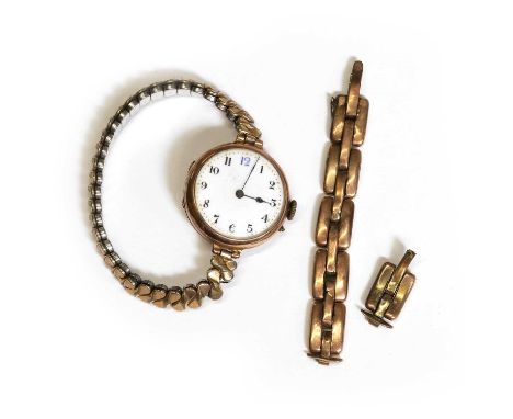 A 9ct gold mechanical bracelet watch. with a 27mm in diameter circular case, a white enamel dial, blue and black Arabic numer