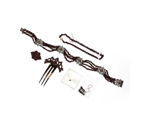 A small collection of Bohemian garnet jewellery, late 19th century/early 20th century, comprising:a Continental silver and ga