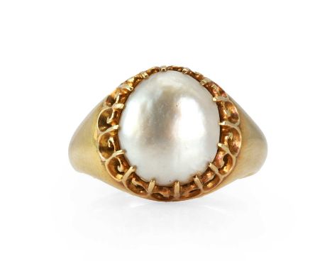 A blister pearl ring,  with a blister pearl, approximately 10mm x 11mm in size, untested, claw set to a pierced scroll galler