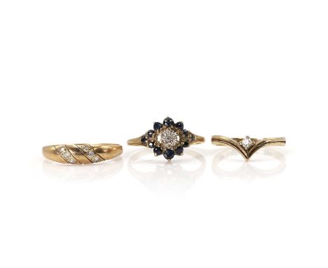 A group of three 9ct gold rings, comprising a sapphire and diamond cluster, London 1982, a 9ct gold diamond ring, Birmingham 