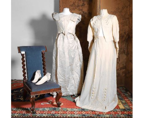 Two summer ensembles, c.1900, comprising a dress cut in cream cotton, the bodice with appliquéd military style detailing, wit