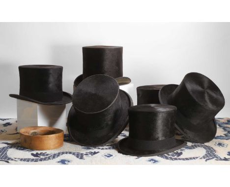 A group of six top hats, late 19th century, comprising six gentlemen's top hats, with five out of the six examples housed in 