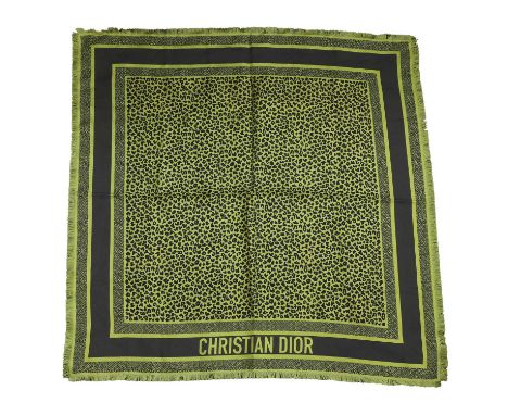 A Dior leopard print silk scarf, of recent manufacture, with black leopard print panel to a lime green ground, with block boa