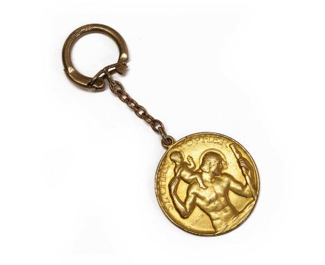 A 9ct gold St Christopher medallion, by Paul Vincze, the medallion 32mm in diameter, London 1960, suspended by a 9ct gold key