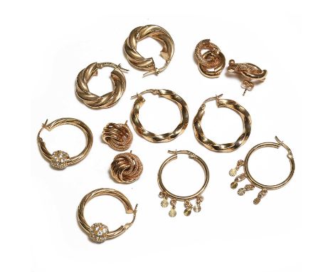 A group of 9ct gold earrings, comprising a pair of 9ct gold hollow twist hoop earrings, a pair of 9ct gold hollow twist hoop 