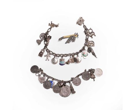 A small group of silver jewellery, comprising a curb link charm bracelet, with a bolt ring clasp, suspending 15 silver charms
