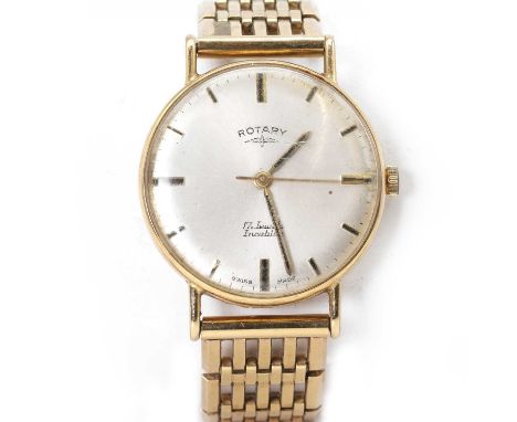 A 9ct gold Rotary mechanical bracelet watch, with a 31mm diameter case, a silvered dial, black and gilt baton hour markers, b