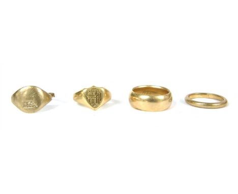 Four gold rings, including an 18ct gold signet ring, the shield shaped head with seal engraved initials, London 1905, size L,