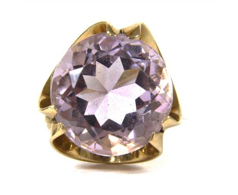 A 9ct gold amethyst ring, round faceted amethyst in a three double claw setting to fluted gallery and D profile shank, London