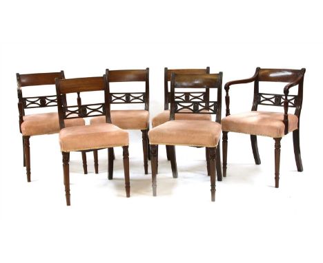 A set of six Regency mahogany dining chairs, the bar backs with pierced splats, and on ring turned legs, two covers and four 