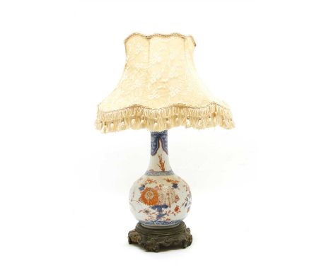 A Japanese porcelain vase table lamp, on a gilt metal stand, with shade, 26cm high (without stand)