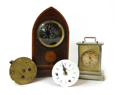 Two cylinder clock movements, a lancet shaped clock case and a 20th century carriage clock (4)