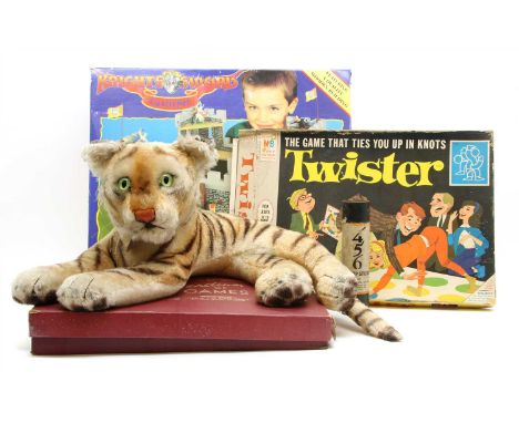 A Steiff tiger , together with a compendium of games, Twister, Pick-up sticks, etc (Qty.)