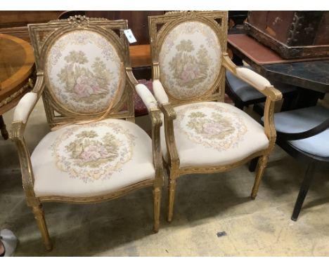 A set of six French giltwood and gesso tapestry back chairs (two with arms)