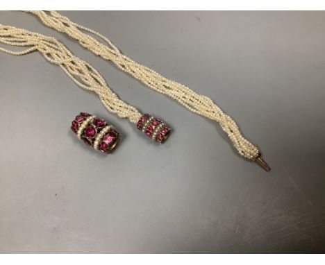 A multi-strand seed pearl necklace with amethyst set barrel clasp, 39cm and matching pendant.