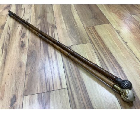 A silver mounted cane and one other faux ivory cane, longest 92cm