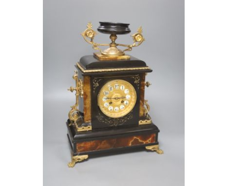 A 19th century French slate and onyx mantel clock, Lyon, height 42cm