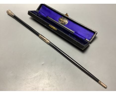 A George V silver mounted ebonised conductors baton in case, 45.3 cm.