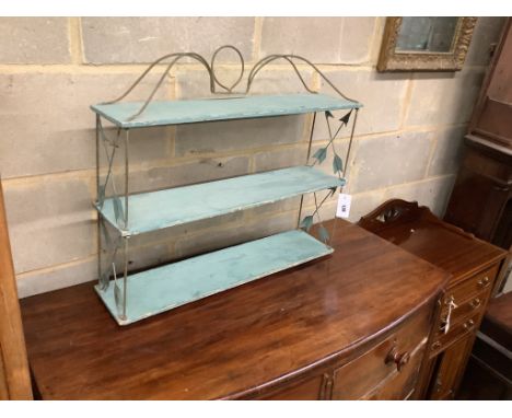 A rectangular giltwood wall mirror, width 56cm, height 44cm together with a painted three tier wall bracket, width 66cm