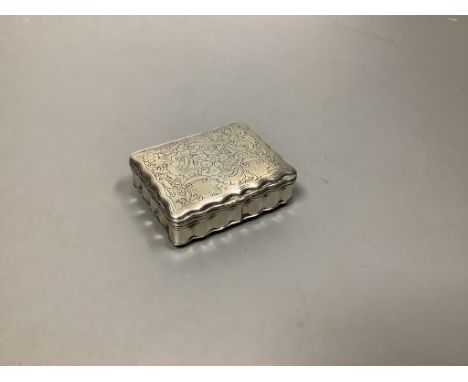 A late 19th/early 20th century Hanau? engraved white metal snuff box,76mm, 87 grams.